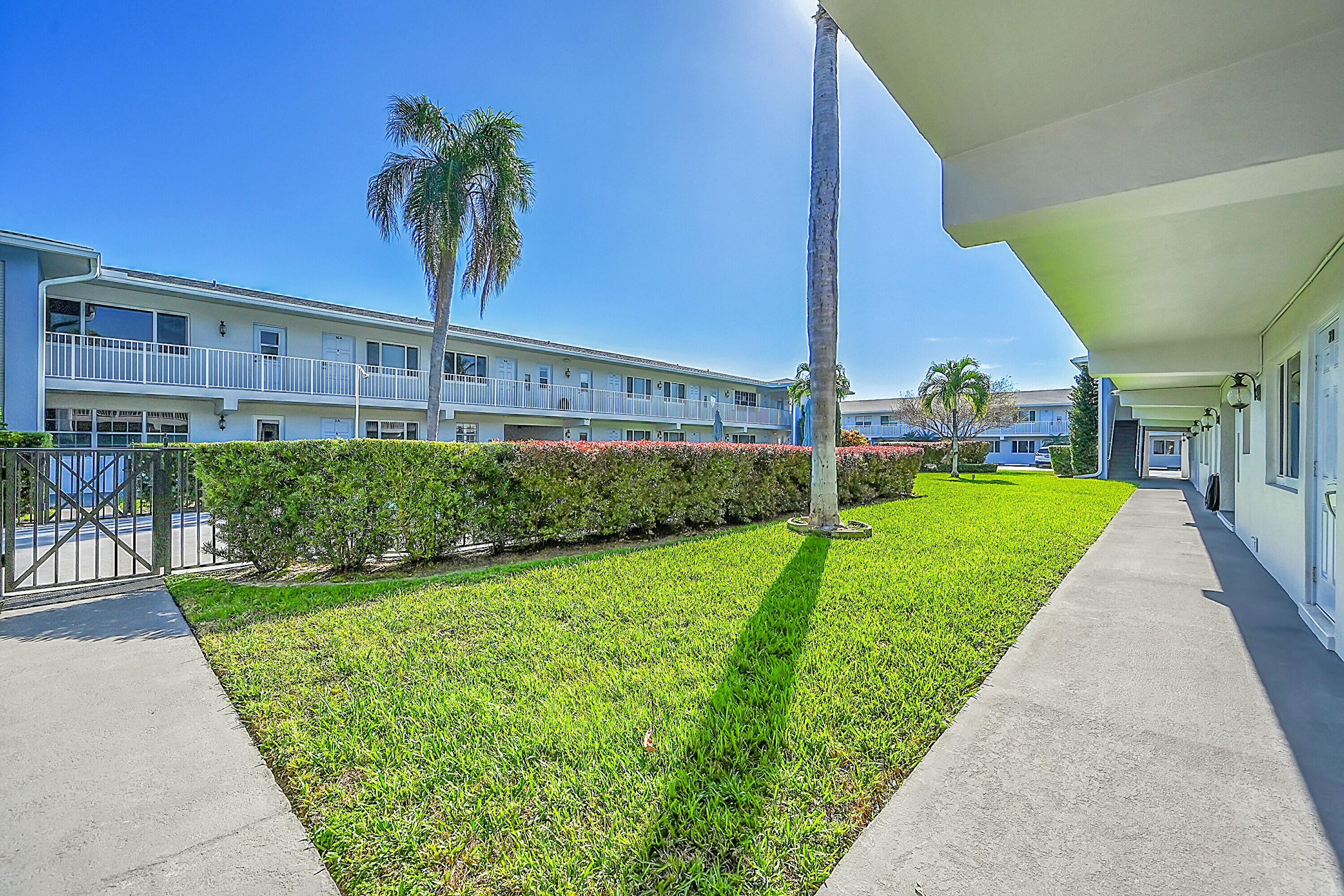 2110 Northeast 42nd Street, Unit 1B Lighthouse Point, FL 33064 - Photo 5 of 45 Pool Entrance