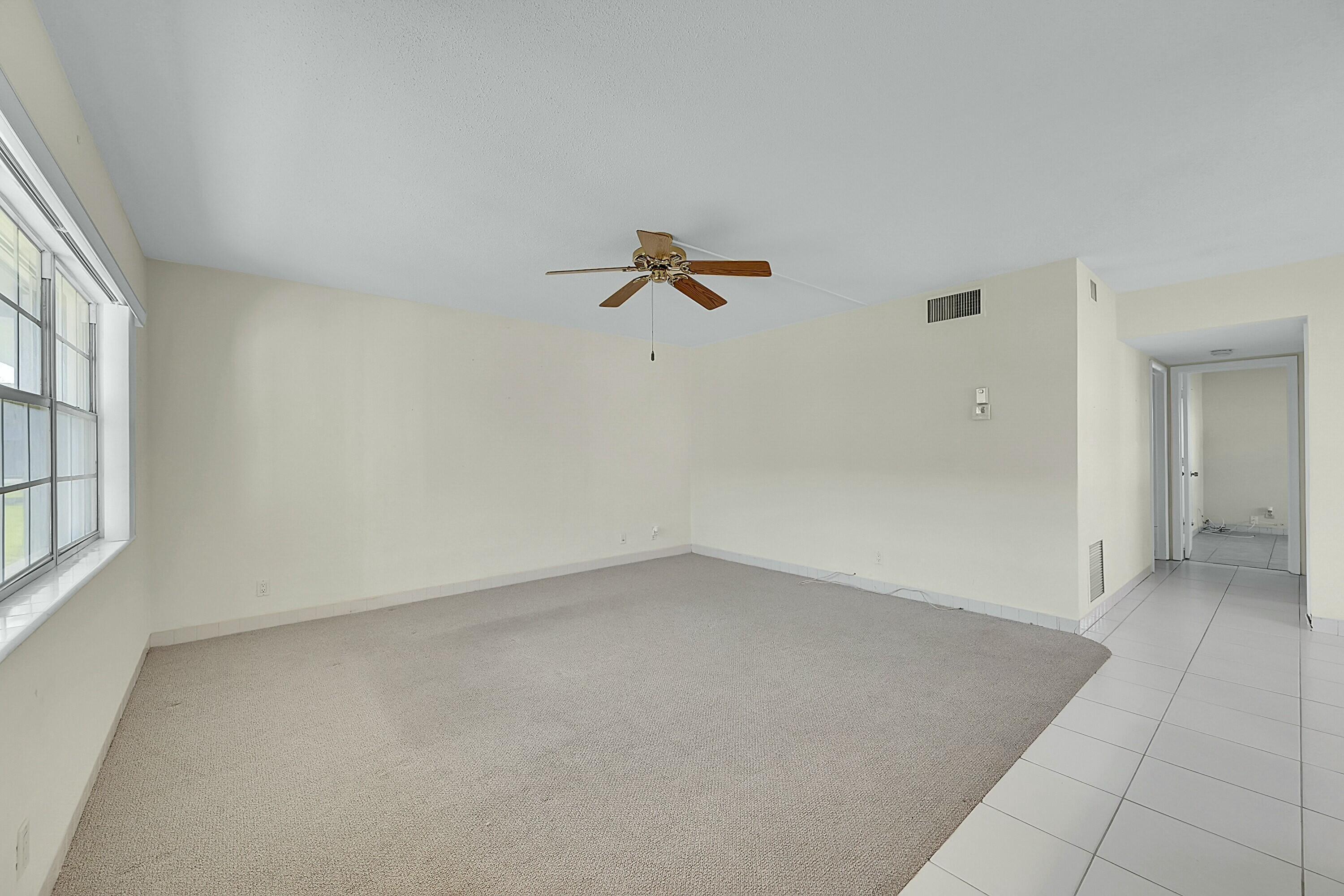 2110 Northeast 42nd Street, Unit 1B Lighthouse Point, FL 33064 - Photo 7 of 45 Living Area