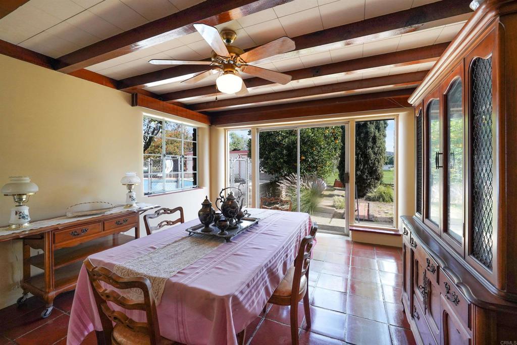 1077 Pine Street Ramona, CA 92065 - Photo 11 of 51 a view of a dining room with furniture window and outside view