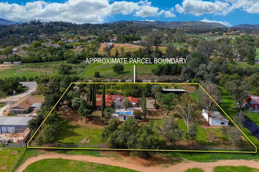 1077 Pine Street Ramona, CA 92065 - Photo 2 of 51 an aerial view of a house with a yard