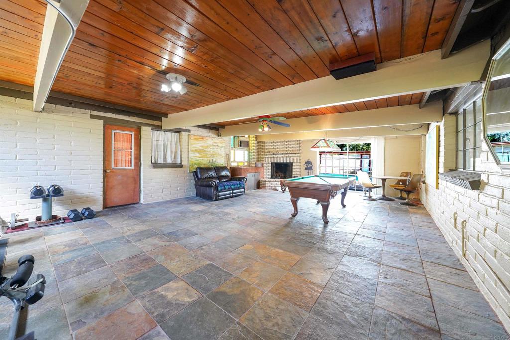 1077 Pine Street Ramona, CA 92065 - Photo 28 of 51 a living room with furniture and a chandelier
