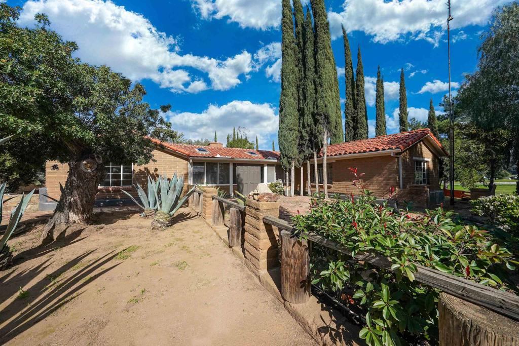 1077 Pine Street Ramona, CA 92065 - Photo 31 of 51 a view of a house with yard and sitting area