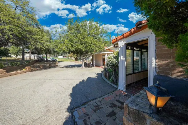 a view of swimming pool with outdoor seating