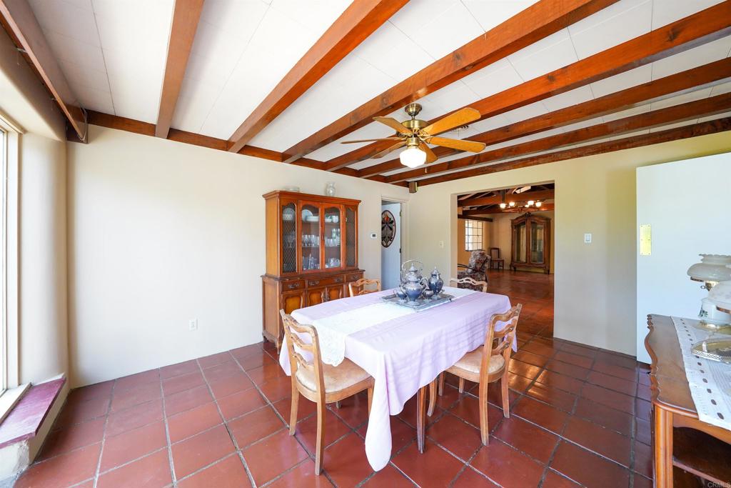 1077 Pine Street Ramona, CA 92065 - Photo 10 of 51 a view of a dining room with furniture and window