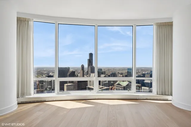 a view of a balcony with city view