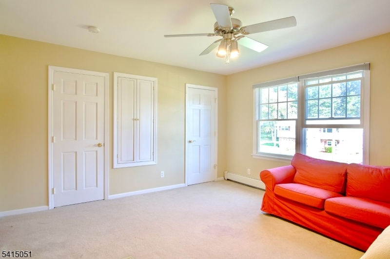4 Budd Street Ledgewood, NJ 07852 - Photo 14 of 22 a living room with furniture and a chandelier