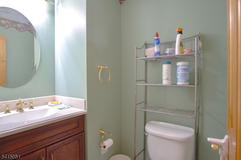 4 Budd Street Ledgewood, NJ 07852 - Photo 18 of 22 a bathroom with a sink a toilet and vanity