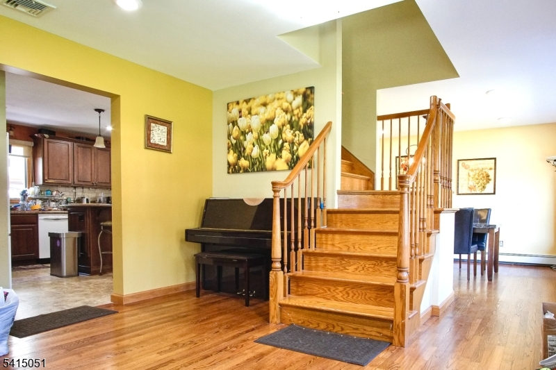 4 Budd Street Ledgewood, NJ 07852 - Photo 3 of 22 a view of a living room with furniture and wooden floor