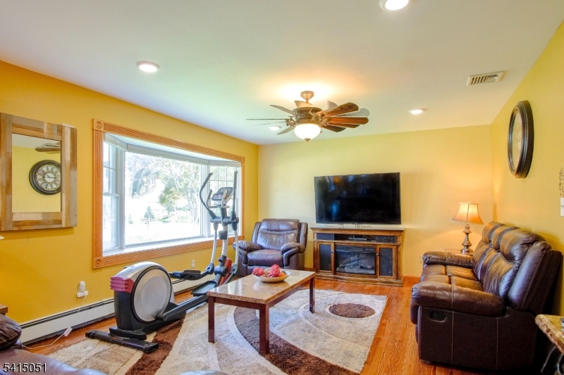 4 Budd Street Ledgewood, NJ 07852 - Photo 4 of 22 a living room with furniture and a flat screen tv