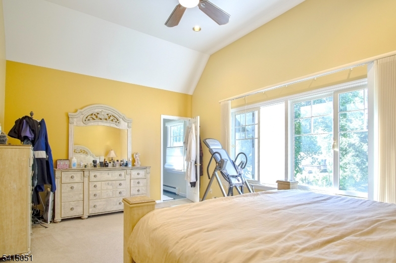 4 Budd Street Ledgewood, NJ 07852 - Photo 8 of 22 a spacious bedroom with a bed a dresser and a large window