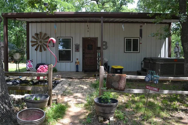 a living room filled with furniture and a fireplace