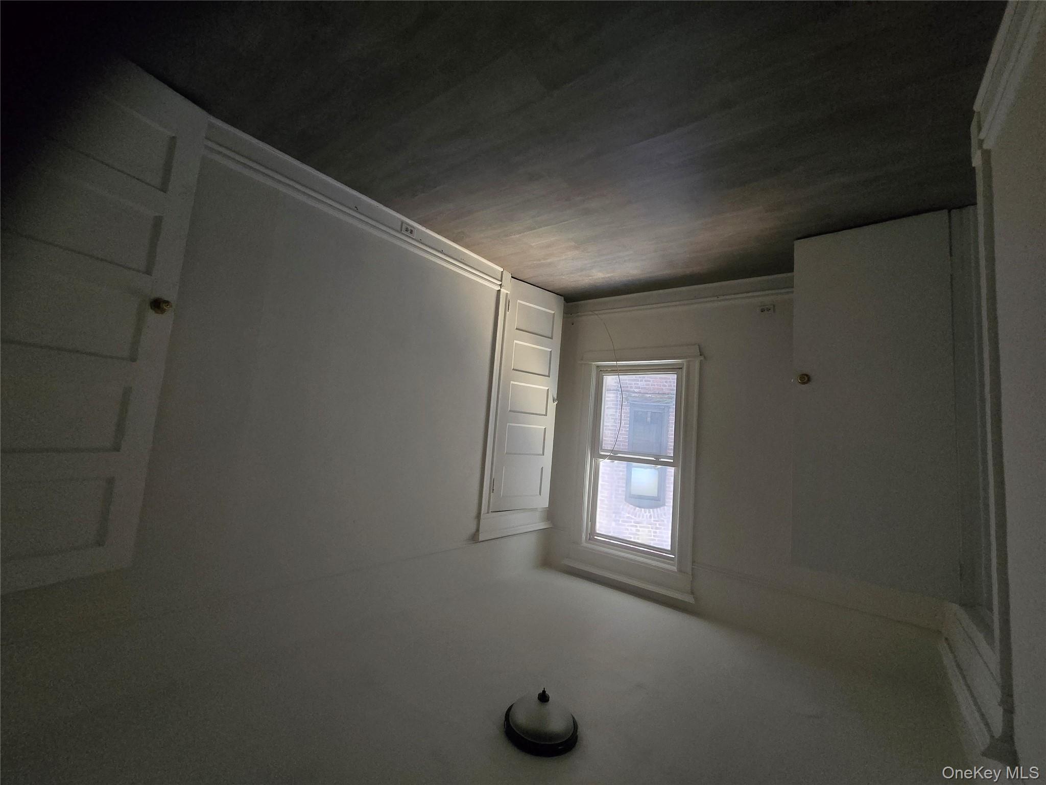 67 Radford Street, Unit 2E Yonkers, NY 10705 - Photo 15 of 19 an empty room with windows