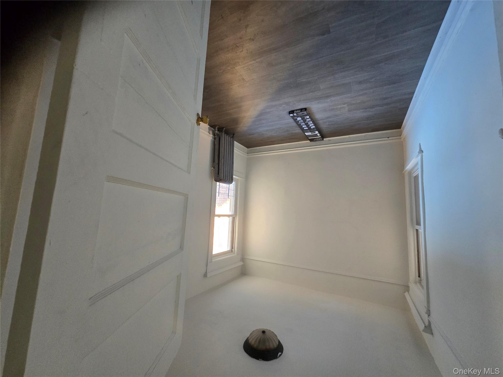 67 Radford Street, Unit 2E Yonkers, NY 10705 - Photo 16 of 19 a bathroom with a sink and a mirror