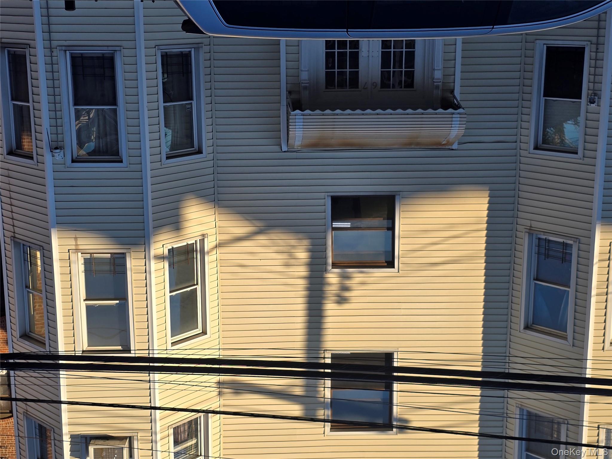 67 Radford Street, Unit 2E Yonkers, NY 10705 - Photo 2 of 19 a view of a building with a window