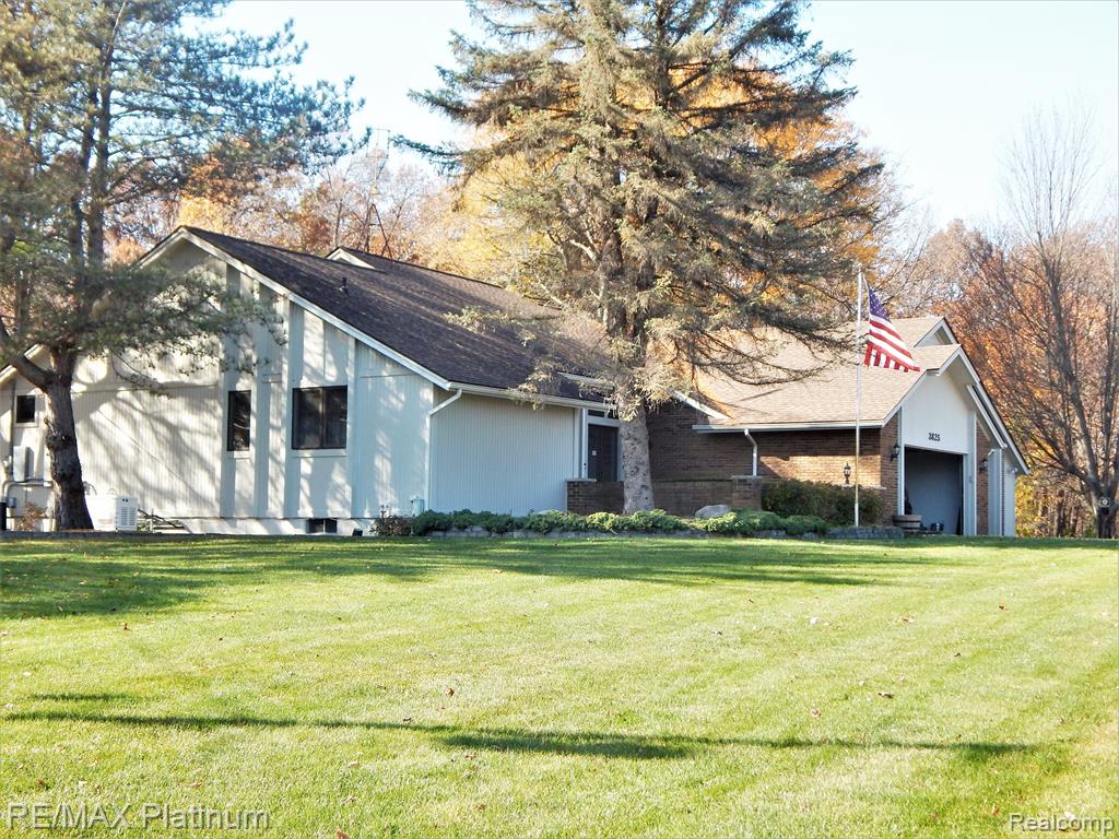 3825 North Hickory Ridge Road Highland, MI 48357 - Photo 5 of 80