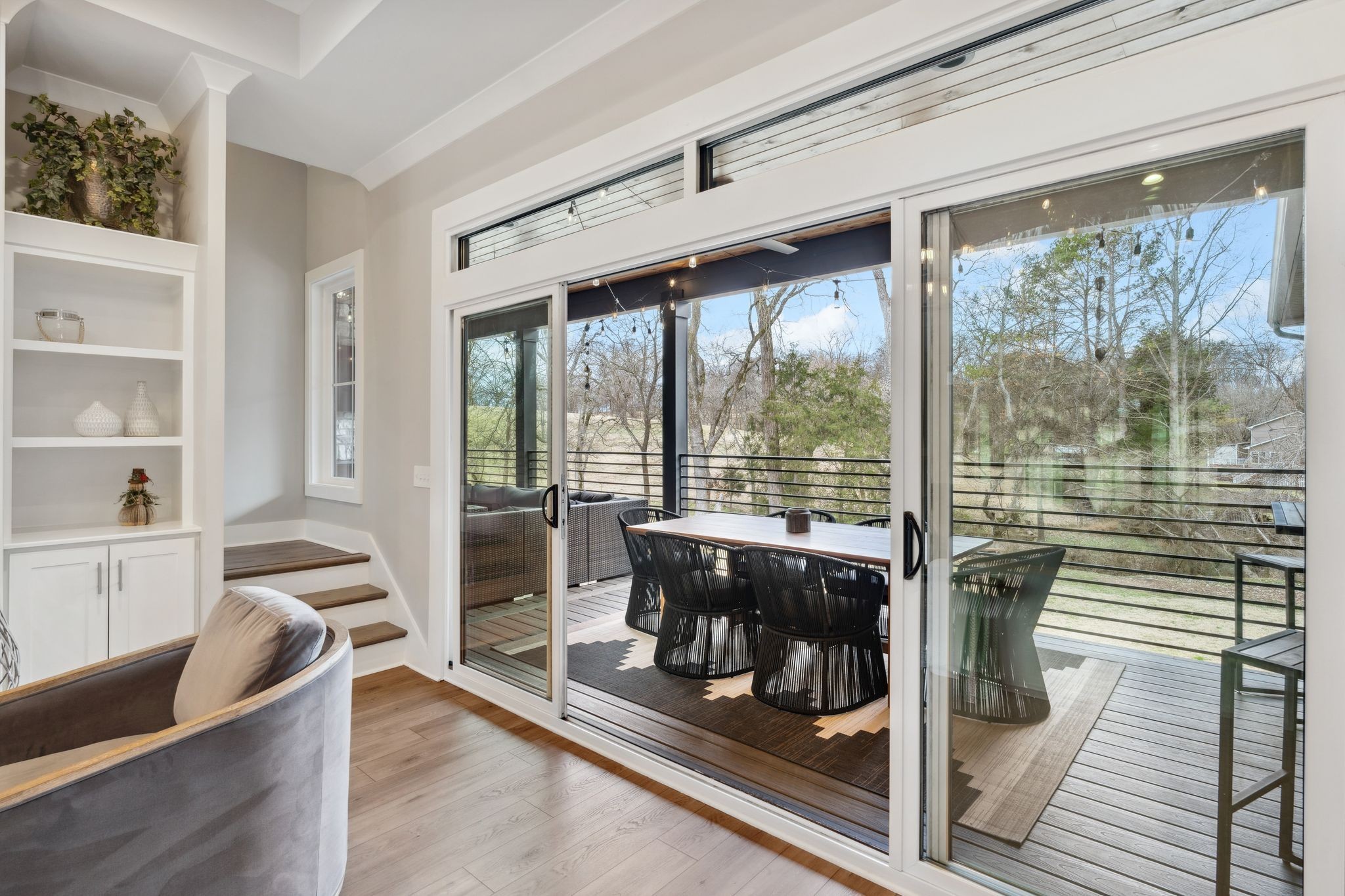 741 Saundersville Ferry Road Mount Juliet, TN 37122 - Photo 14 of 89 a living room with furniture and a floor to ceiling window