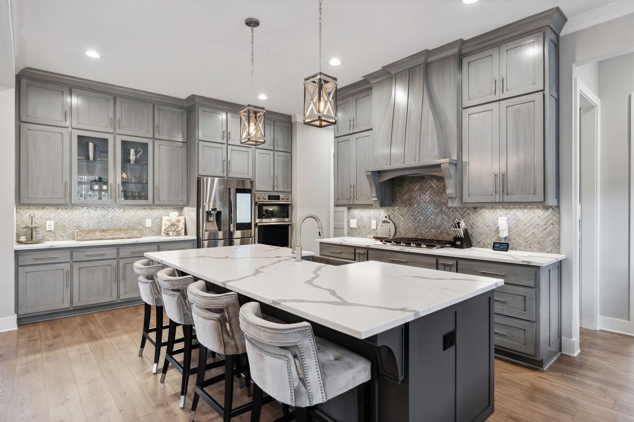 741 Saundersville Ferry Road Mount Juliet, TN 37122 - Photo 20 of 89 a kitchen with granite countertop a sink a center island stainless steel appliances and cabinets