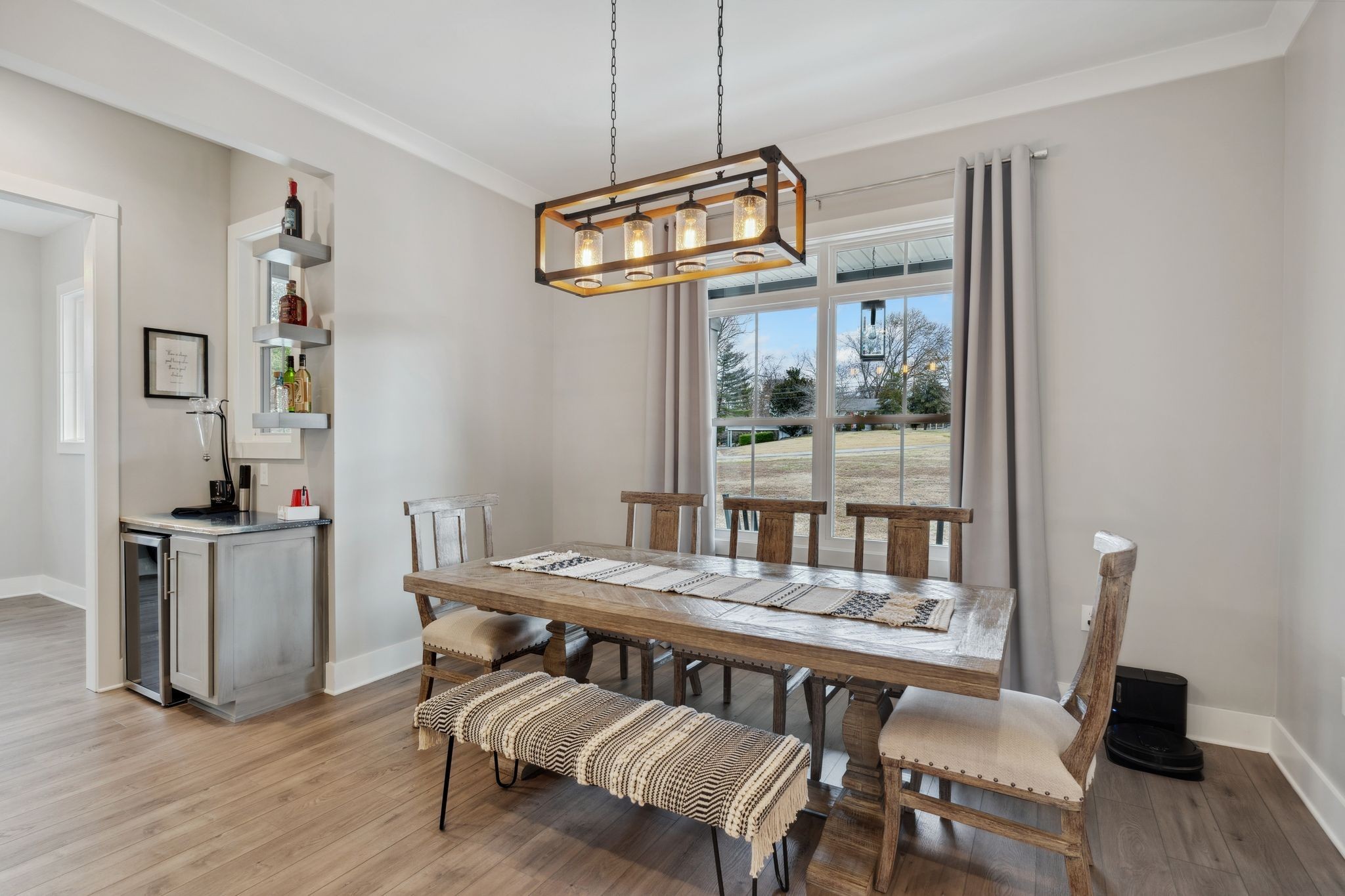 741 Saundersville Ferry Road Mount Juliet, TN 37122 - Photo 22 of 89 a view of a dining room with furniture wooden floor and a chandelier