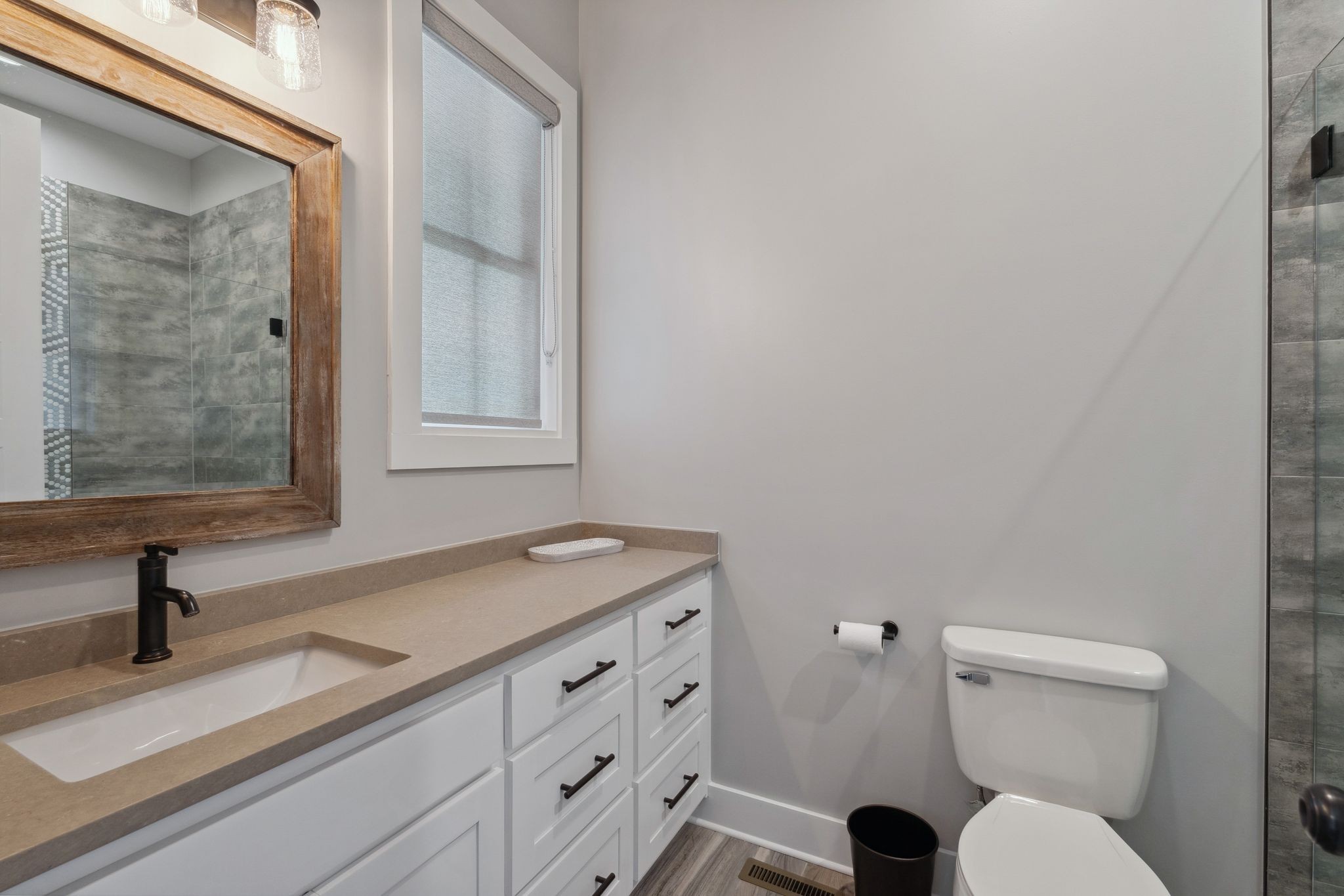 741 Saundersville Ferry Road Mount Juliet, TN 37122 - Photo 30 of 89 a bathroom with a sink and a toilet
