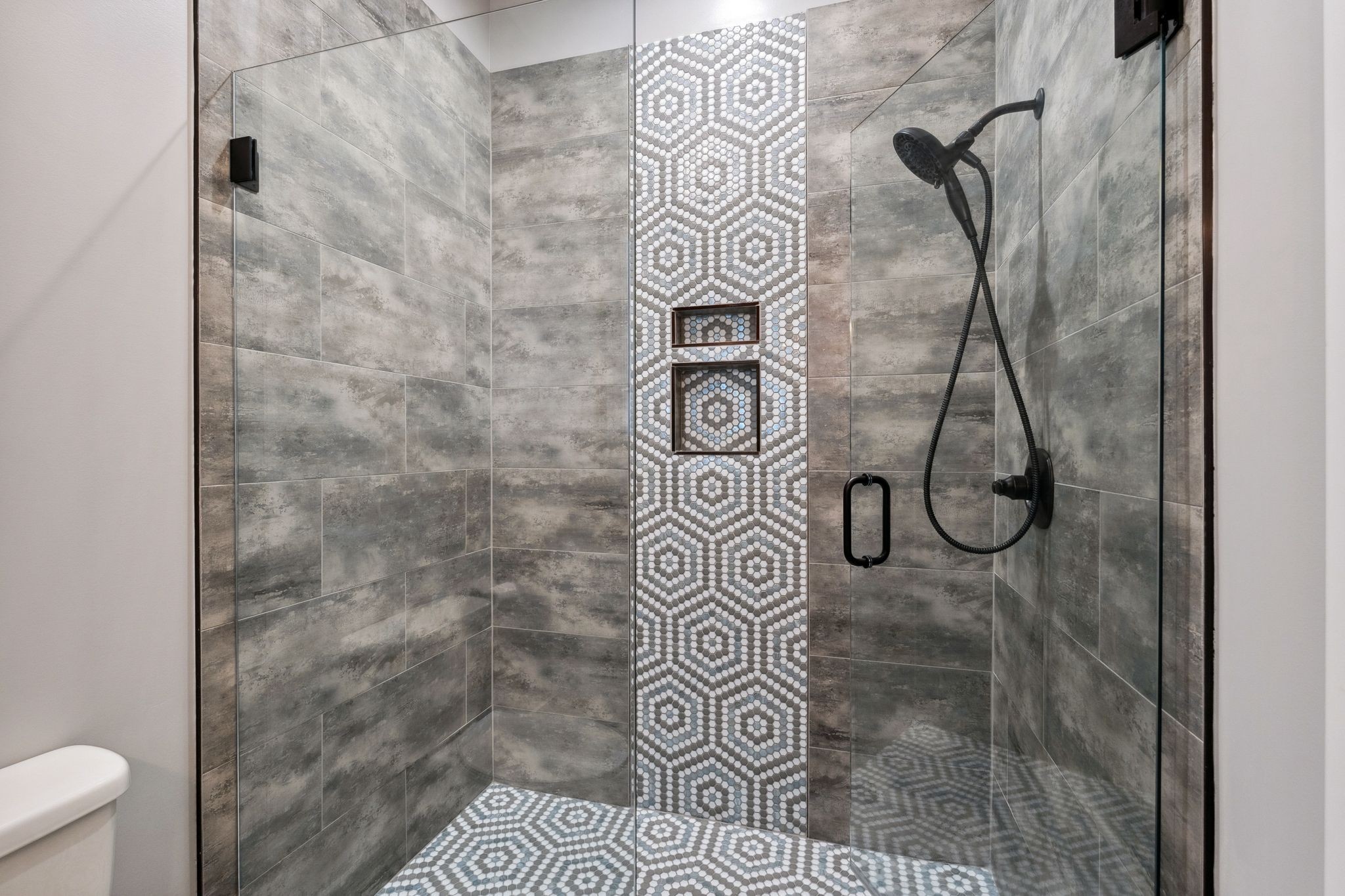 741 Saundersville Ferry Road Mount Juliet, TN 37122 - Photo 31 of 89 a bathroom with a shower and a toilet