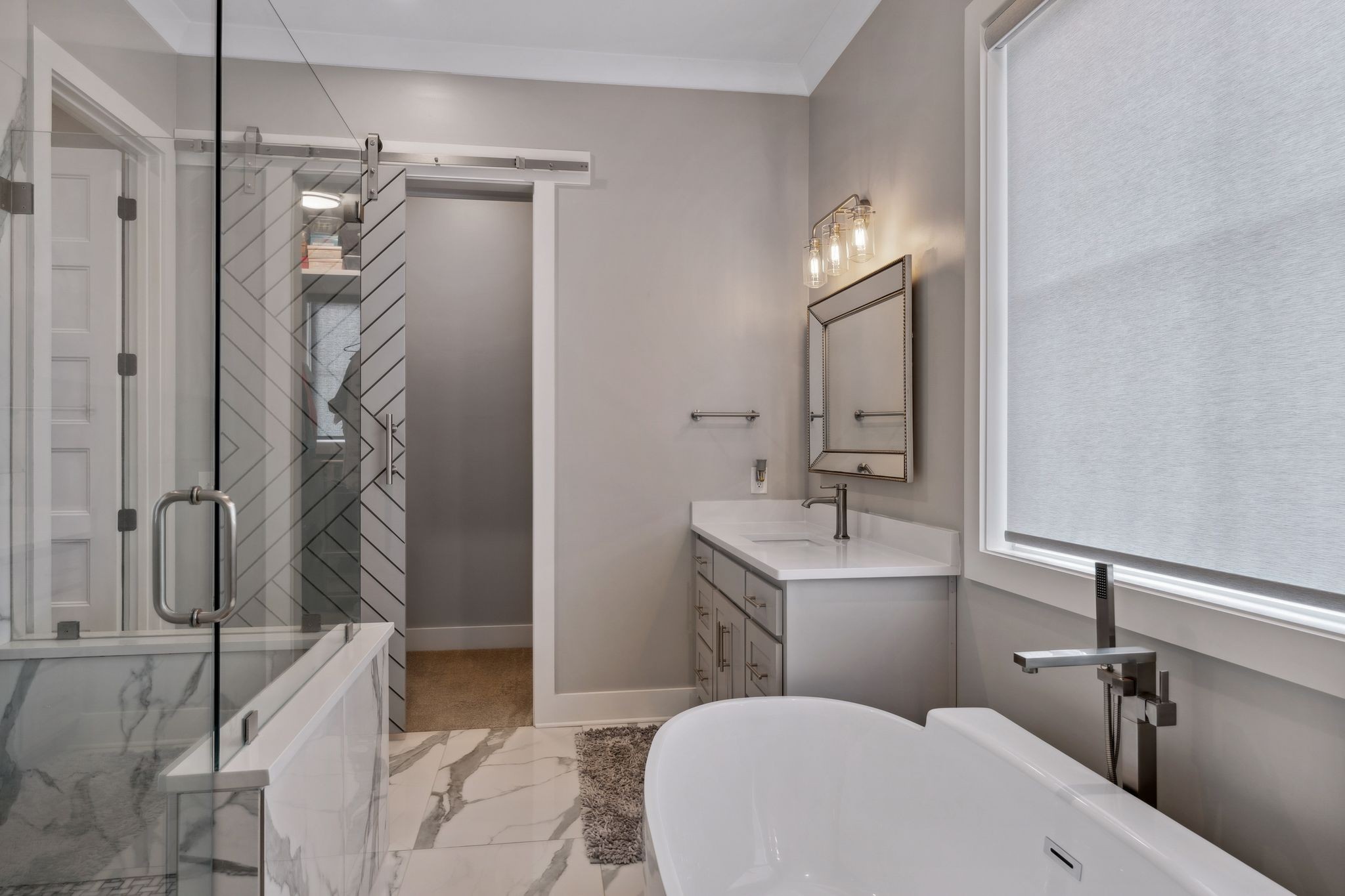 741 Saundersville Ferry Road Mount Juliet, TN 37122 - Photo 37 of 89 a bathroom with a sink a toilet and shower