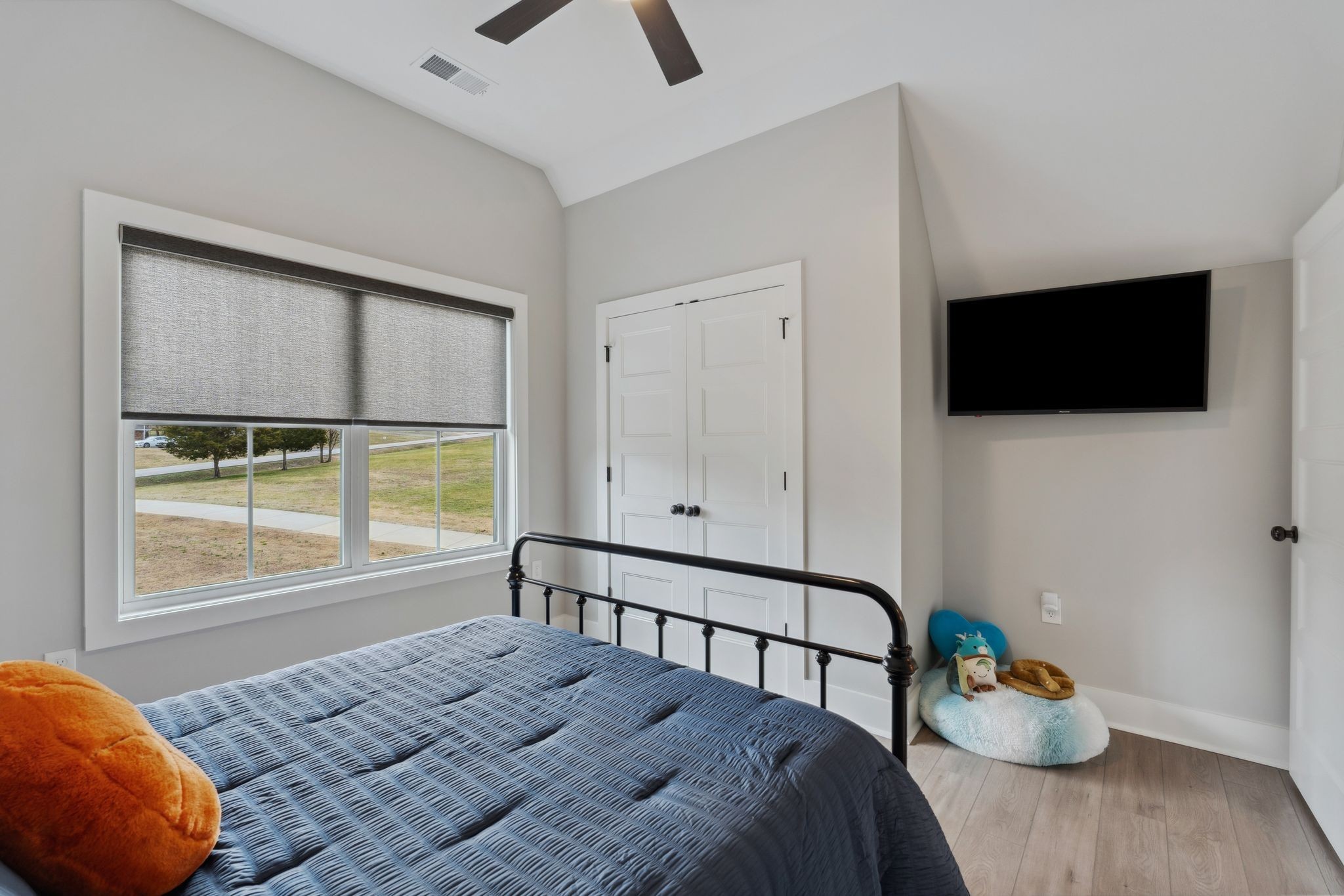 741 Saundersville Ferry Road Mount Juliet, TN 37122 - Photo 43 of 89 a bedroom with a bed and a flat screen tv