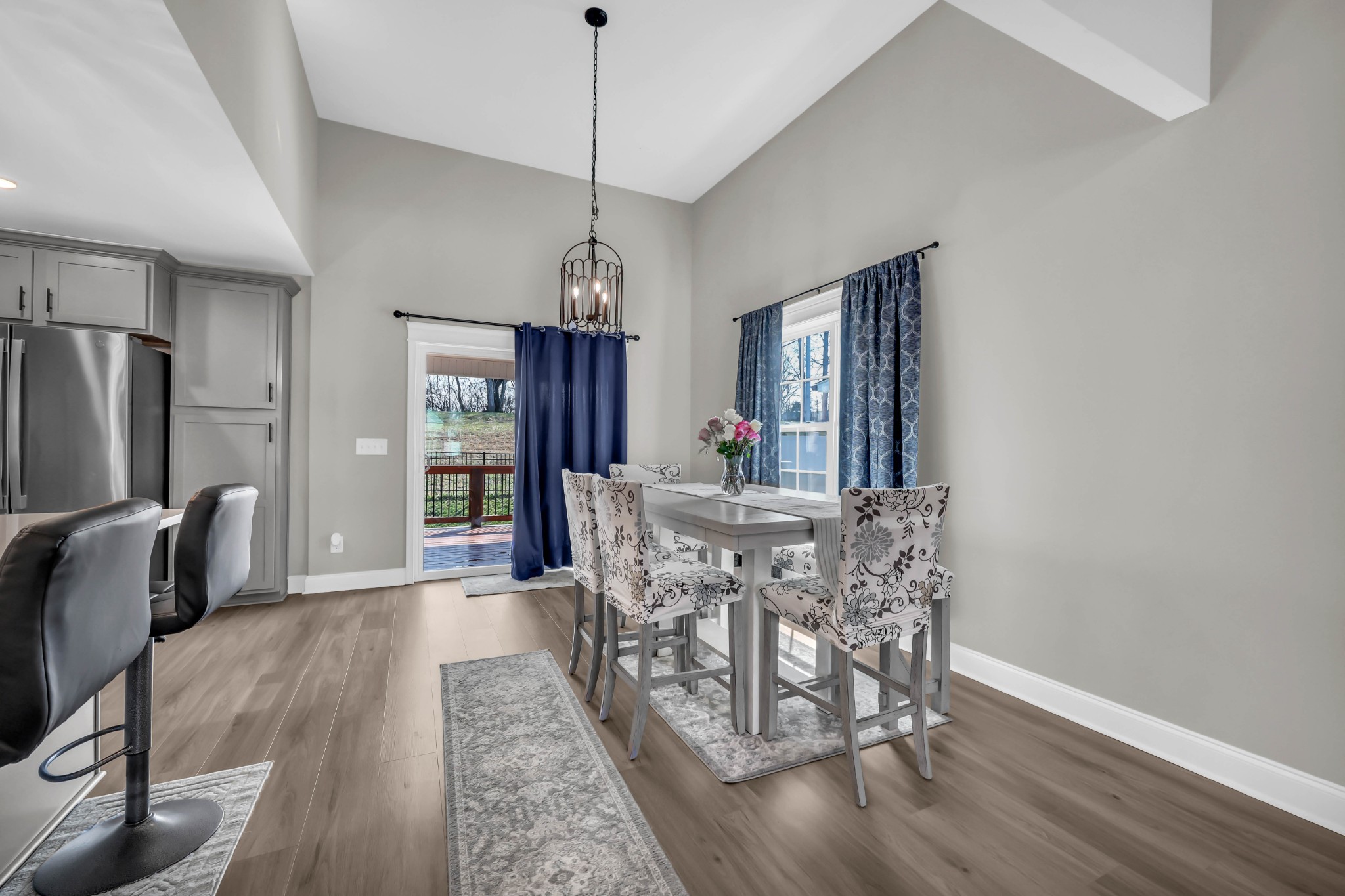 834 Limestone Way Clarksville, TN 37043 - Photo 11 of 26 a view of a dining room with furniture window and wooden floor