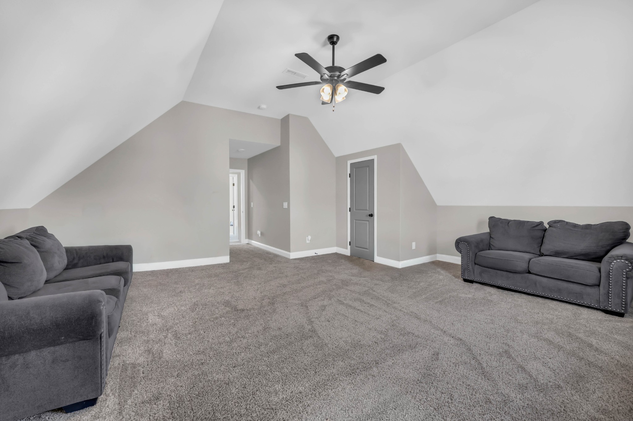 834 Limestone Way Clarksville, TN 37043 - Photo 22 of 26 a living room with furniture and a ceiling fan