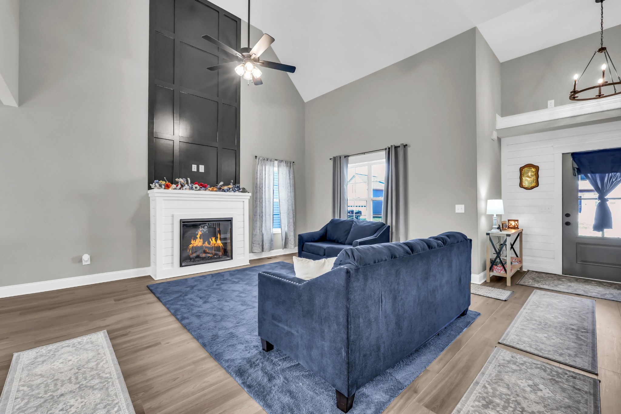 834 Limestone Way Clarksville, TN 37043 - Photo 7 of 26 a living room with furniture and a fireplace