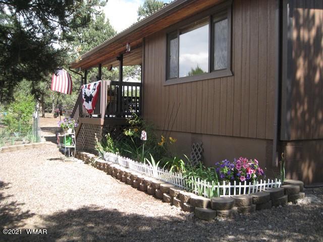 2091 Ranger Road Overgaard, AZ 85933 - Photo 3 of 66 a front view of a house
