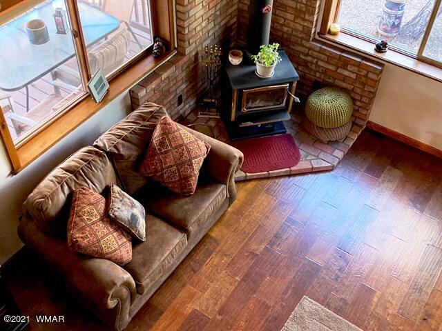 2091 Ranger Road Overgaard, AZ 85933 - Photo 35 of 66 a living room with furniture and a wooden floor