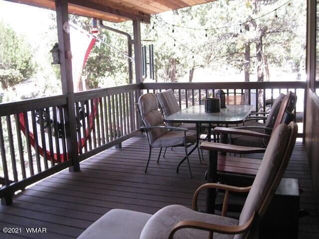 2091 Ranger Road Overgaard, AZ 85933 - Photo 38 of 66 a view of a balcony with furniture