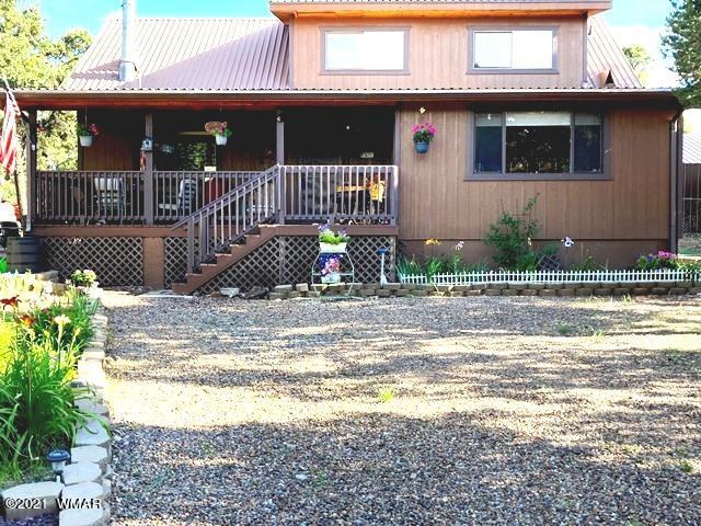 2091 Ranger Road Overgaard, AZ 85933 - Photo 5 of 66 a front view of a house