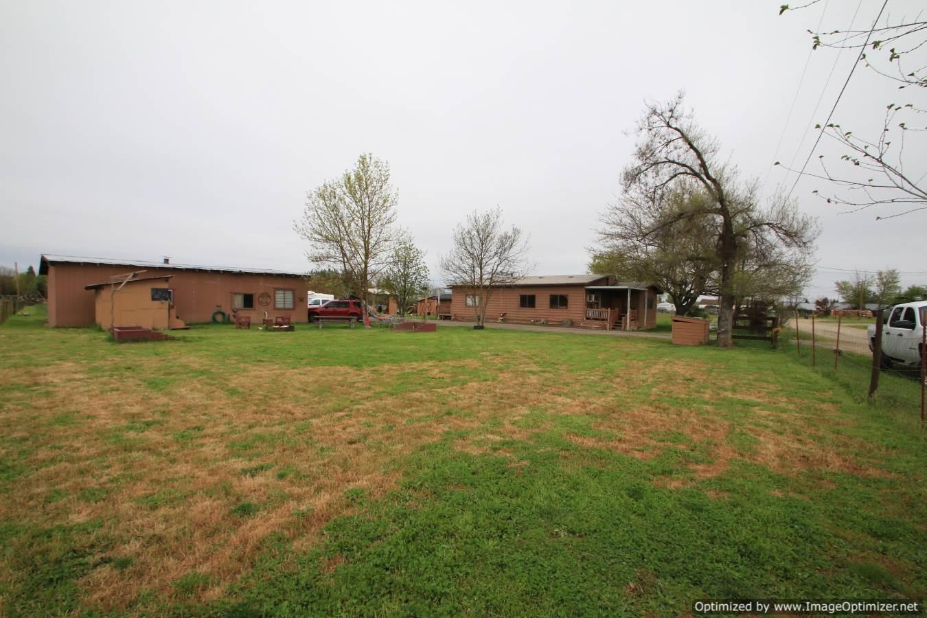 2531 East Gregory Road Central Point, OR 97502 - Photo 10 of 21 a view of a house with a yard