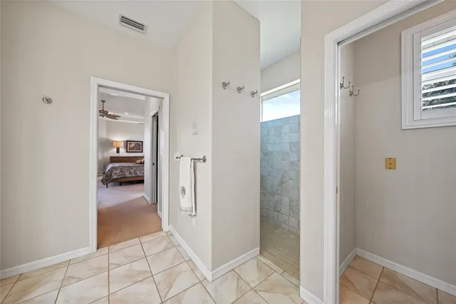 a large kitchen with stainless steel appliances kitchen island granite countertop a large counter top and stainless steel appliances