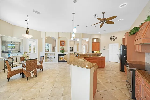 a bedroom with a bed mirror and a window