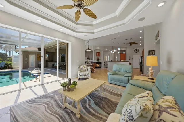 a view of swimming pool with seating area