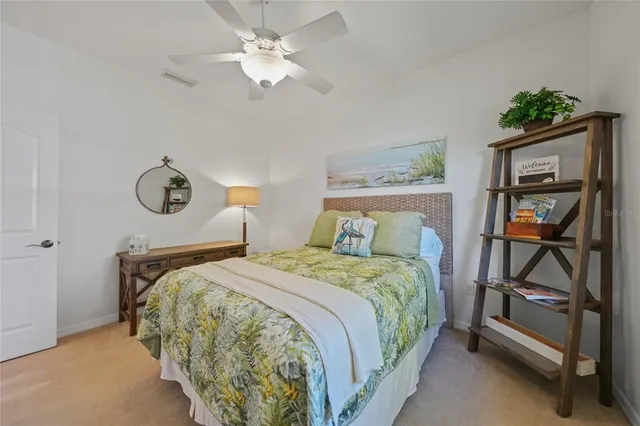 a view of a swimming pool with outdoor seating
