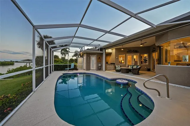 a view of a dining room with furniture and window