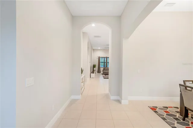 a view of a hallway view with living room