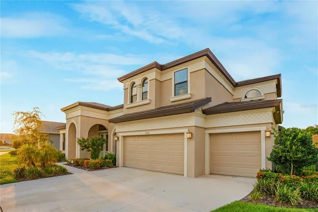 a view of a patio with a table and chairs