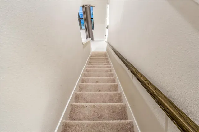 a view of pool table and chair