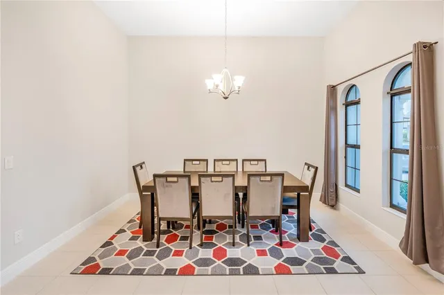 a bedroom with double bed and a window