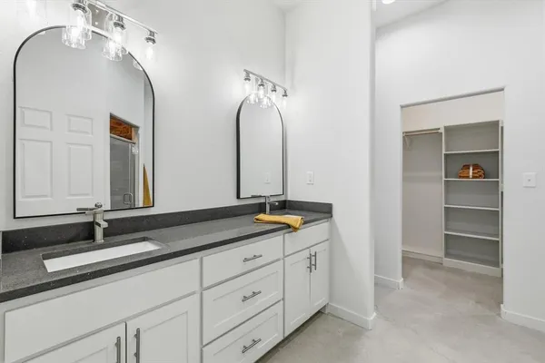 a view of a house with a yard and garage