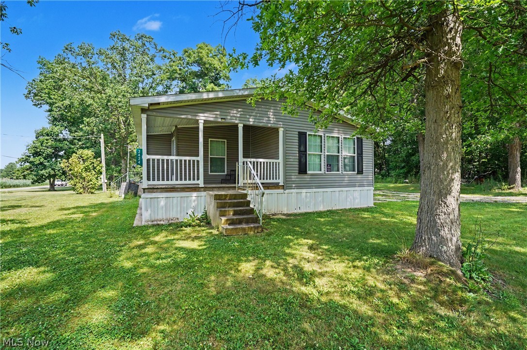 3424 Painesville Warren State Road Southington, OH 44470 - Photo 3 of 50 3424 Painesville Warren Rd, Southington, OH 44470 – Enjoy comfortable one-floor living in this well-maintained home built in 2018. Featuring 3 bedrooms, 2 full bathrooms, and an open-concept layout, this home offers both functionality and convenience. The spacious kitchen, dining, and living areas provide plenty of room for everyday living and entertaining. A large garage offers ample space for vehicles, storage, hobbies, or workshop needs. Situated on a generous lot with a welcoming front porch, this property combines modern living with a peaceful country setting. Move-in ready and waiting for its next owner!