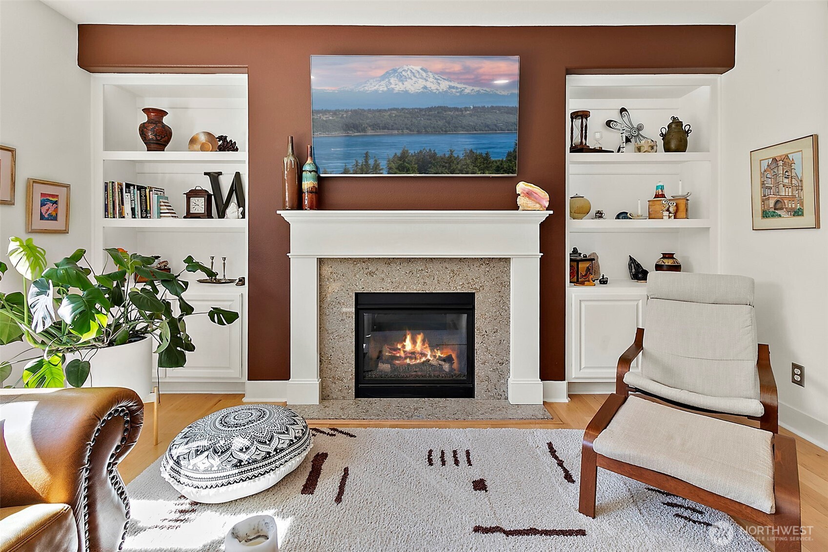 4917 Northeast 8th Street Renton, WA 98059 - Photo 14 of 37 a living room with furniture and a fireplace