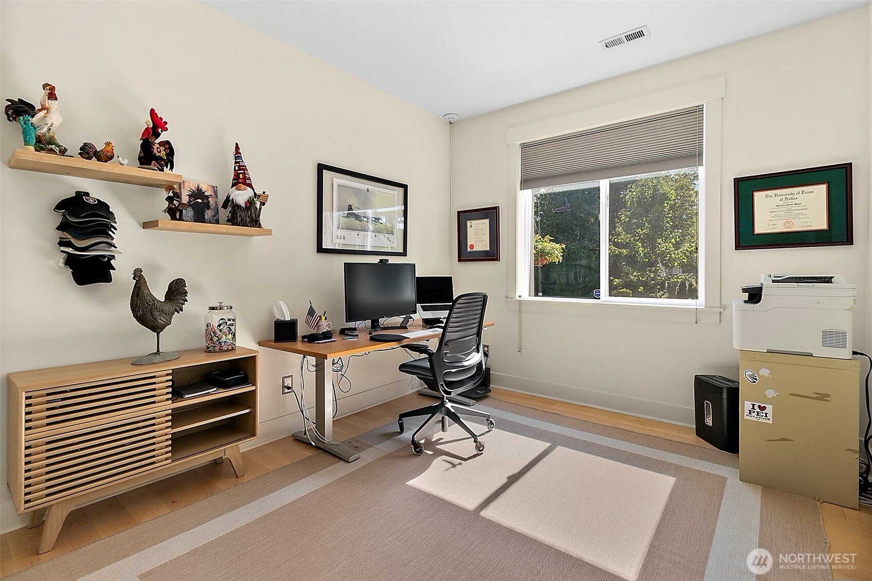 4917 Northeast 8th Street Renton, WA 98059 - Photo 15 of 37 a view of a workspace with furniture and a window