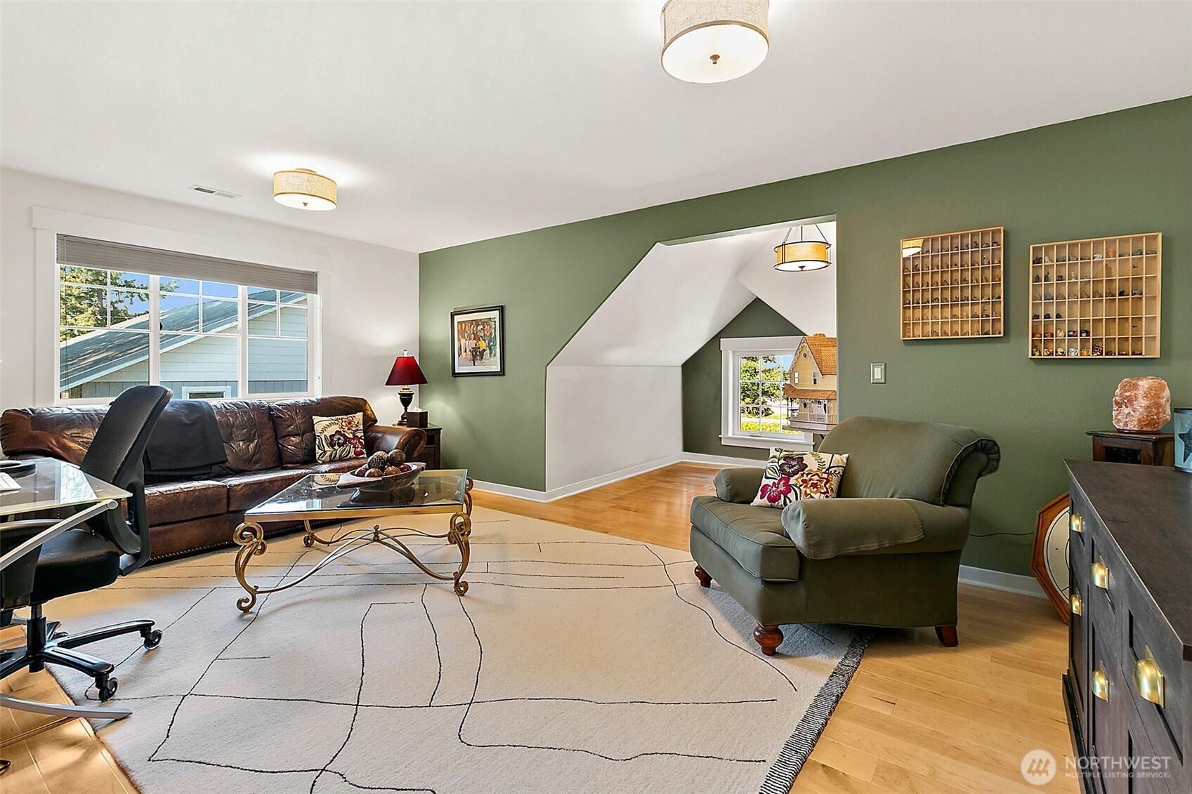 4917 Northeast 8th Street Renton, WA 98059 - Photo 27 of 37 a living room with furniture and a window