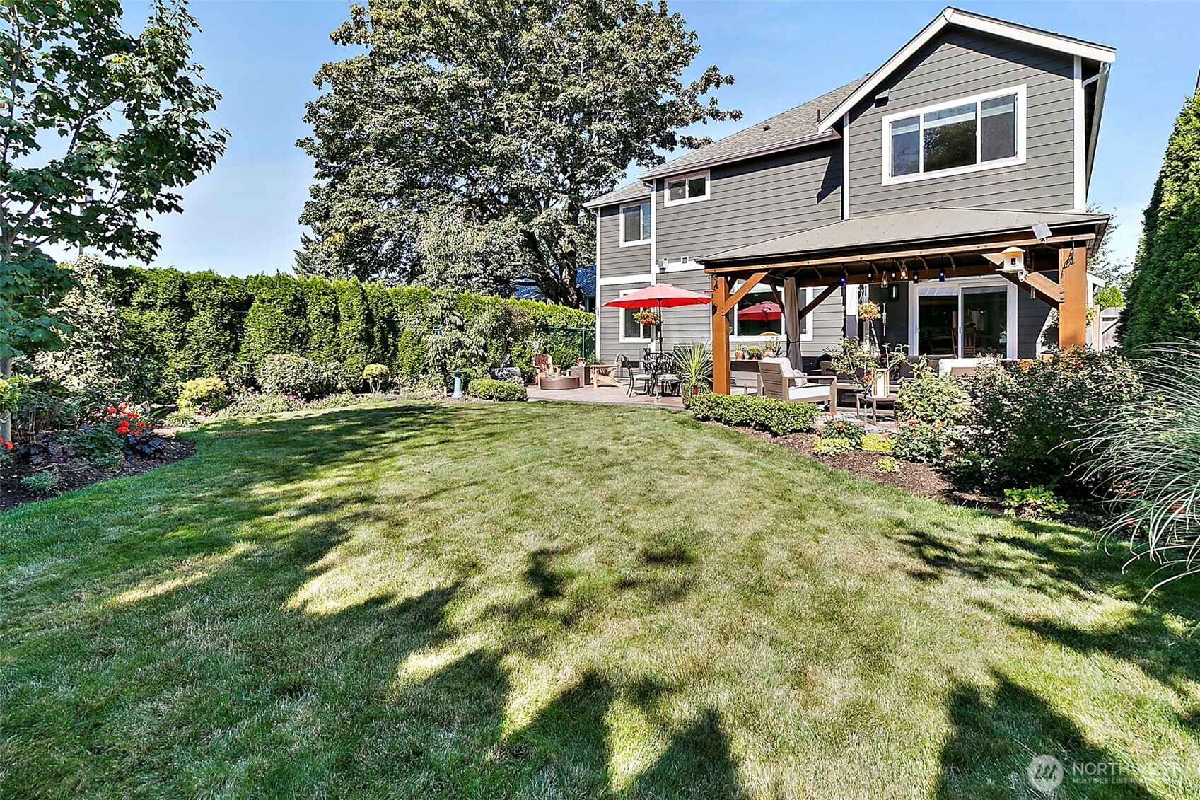 4917 Northeast 8th Street Renton, WA 98059 - Photo 33 of 37 a view of house with a outdoor space