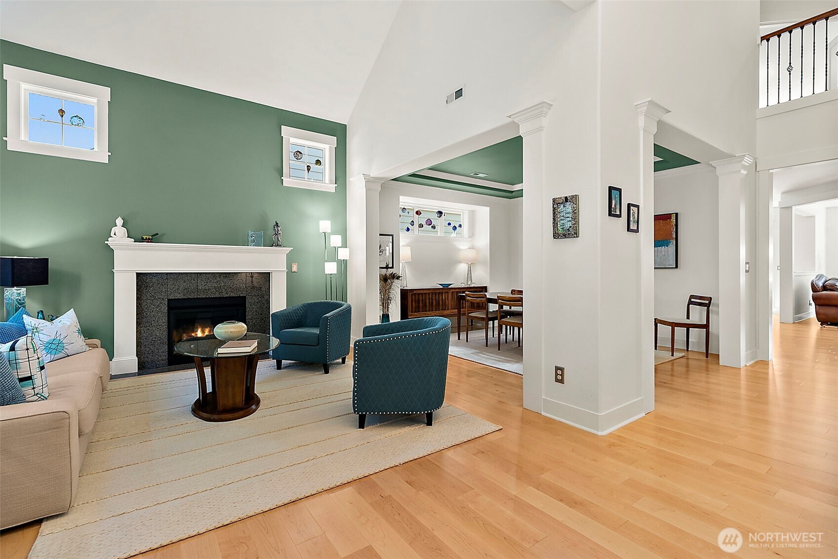 4917 Northeast 8th Street Renton, WA 98059 - Photo 4 of 37 a living room with furniture and a fireplace